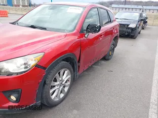 2015 Mazda CX-5 Grand Touring with VIN JM3KE4DY1F0540586, listed as a IAAI auction lot 41710216 with 148,800 mi miles. Bid and sale history available at carsss.com. Image 6.