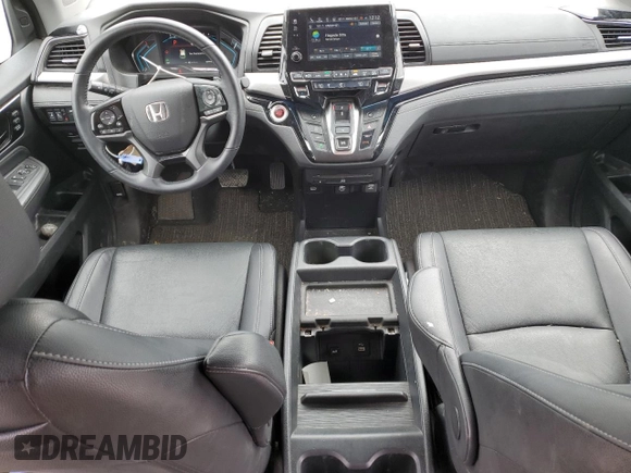 2022 Honda Odyssey Touring with VIN 5FNRL6H8XNB016064, listed as a Copart auction lot 65289595 with 24,946 mi miles and Salvage title. Bid and sale history available at DreamBid. Image 8.