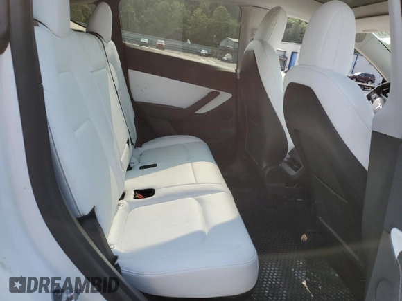 2022 Tesla Model Y Long Range z VIN 7SAYGDEE5NF355624, wystawiony jako Copart lot #58058465 z przebiegiem 33 784 mil mil oraz Szkoda całkowita • Salvage title. Historia ofert i sprzedaży dostępna na DreamBid. Obrazek 10.