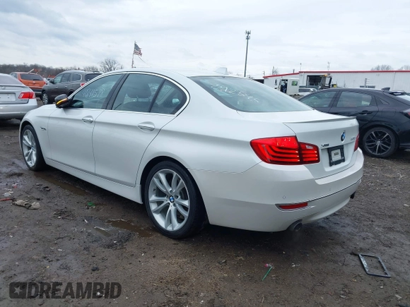 2014 BMW 5 Series 535i xDrive with VIN WBA5B3C50ED292545, listed as a IAAI auction lot 41841578 with 99,072 mi miles and . Bid and sale history available at carsss.com. Image 3.