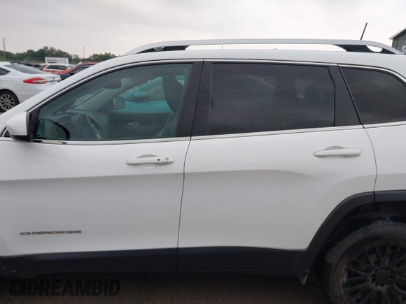 2019 Jeep Cherokee Latitude Plus with VIN 1C4PJLLX9KD203048, listed as a IAAI auction lot 42293811 with 56,221 mi miles and . Bid and sale history available at DreamBid. Image 15.