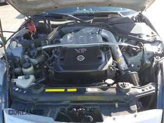 2003 Nissan 350Z Touring z VIN JN1AZ34E23T019866, wystawiony jako IAAI lot #41293510 z przebiegiem 118 416 mil mil oraz . Historia ofert i sprzedaży dostępna na DreamBid. Obrazek 10.