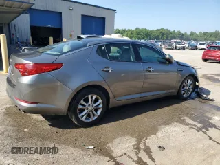 2013 Kia Optima EX z VIN 5XXGN4A73DG228548, wystawiony jako Copart lot #62209395 z przebiegiem 142 692 mil mil oraz Szkoda całkowita • Salvage title. Historia ofert i sprzedaży dostępna na DreamBid. Obrazek 3.