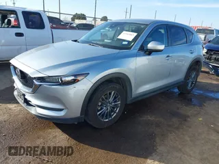 2020 Mazda CX-5 Touring with VIN JM3KFACM1L0789394, listed as a IAAI auction lot 41565887 with 73,730 mi miles. Bid and sale history available at carsss.com. Image 2.