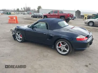 2003 Porsche Boxster S с VIN WP0CB29853U662035, выставлен на аукционе IAAI как лот 41845536 с пробегом 42 026 миль миль и . История ставок и продаж доступна на DreamBid. Изображение 3.