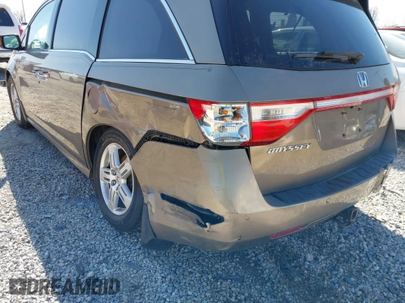 2012 Honda Odyssey Touring with VIN 5FNRL5H9XCB110672, listed as a IAAI auction lot 41826895 with 159,927 mi miles. Bid and sale history available at carsss.com. Image 6.