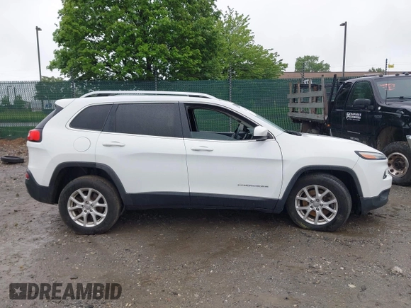 2016 Jeep Cherokee Altitude with VIN 1C4PJMCB8GW372242, listed as a IAAI auction lot 42214287 with 87,597 mi miles and . Bid and sale history available at DreamBid. Image 12.