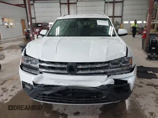2018 Volkswagen Atlas SE with VIN 1V2KR2CA2JC569381, listed as a IAAI auction lot 41843200 with 87,769 mi miles and . Bid and sale history available at DreamBid. Image 12.
