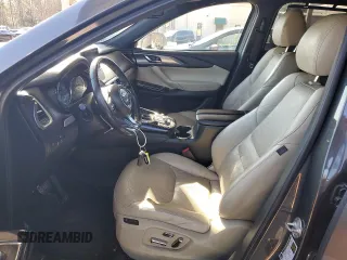 2018 Mazda CX-9 Grand Touring z VIN JM3TCADY6J0210136, wystawiony jako Copart lot #43649245 z przebiegiem 145 921 mil mil oraz Czysty tytuł • Clean title. Historia ofert i sprzedaży dostępna na DreamBid. Obrazek 7.