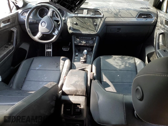 2021 Volkswagen Tiguan SE with VIN 3VV3B7AXXMM069410, listed as a Copart auction lot 58994325 with 55,846 mi miles and Salvage title. Bid and sale history available at DreamBid. Image 8.