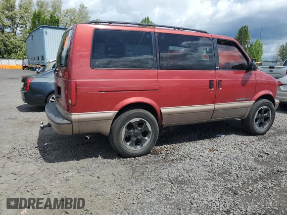 2001 GMC Safari z VIN 1GKEL19W61B514522, wystawiony jako Copart lot #57143155 z przebiegiem Nie podano mil oraz Szkoda całkowita • Salvage title. Historia ofert i sprzedaży dostępna na DreamBid. Obrazek 3.