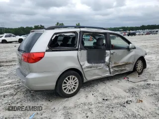 2010 Toyota Sienna XLE with VIN 5TDYK4CC1AS322395, listed as a Copart auction lot 60520215 with 148,725 mi miles and Salvage title. Bid and sale history available at DreamBid. Image 3.