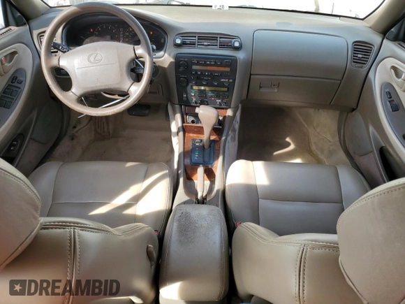1995 Lexus ES 300 with VIN JT8GK13T8S0107061, listed as a Copart auction lot 49986875 with 306,343 mi miles and Salvage Title. Bid and sale history available at DreamBid. Image 8.