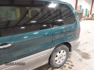 2003 Kia Sedona LX with VIN KNDUP131336390410, listed as a IAAI auction lot 41602426 with 170,613 mi miles. Bid and sale history available at carsss.com. Image 6.