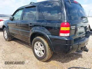 2005 Ford Escape Limited with VIN 1FMYU04155KE48512, listed as a IAAI auction lot 42196239 with 307,005 mi miles and . Bid and sale history available at DreamBid. Image 3.