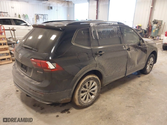 2019 Volkswagen Tiguan S with VIN 3VV0B7AX3KM182311, listed as a IAAI auction lot 41727114 with 98,035 mi miles. Bid and sale history available at carsss.com. Image 4.