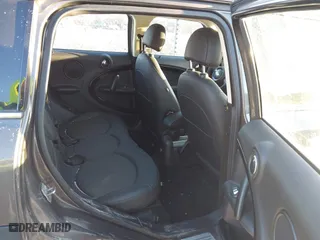 2013 MINI Cooper Countryman with VIN WMWZB3C58DWM31146, listed as a IAAI auction lot 41423661 with 97,505 mi miles. Bid and sale history available at carsss.com. Image 8.