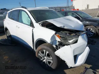 2016 Toyota RAV4 LE with VIN 2T3BFREV5GW411917, listed as a IAAI auction lot 41877542 with 52,512 mi miles. Bid and sale history available at carsss.com. Image 1.