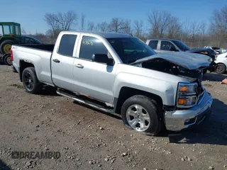 2014 Chevrolet Silverado 1500 LT with VIN 1GCVKREC0EZ151088, listed as a IAAI auction lot 41763808 with 124,668 mi miles and . Bid and sale history available at DreamBid. Image 1.