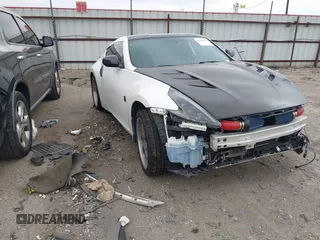 2016 Nissan 370Z Sport z VIN JN1AZ4EH1GM930883, wystawiony jako IAAI lot #41909945 z przebiegiem 80 484 mil mil oraz . Historia ofert i sprzedaży dostępna na DreamBid. Obrazek 1.