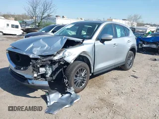 2019 Mazda CX-5 Sport with VIN JM3KFBBM7K0668830, listed as a IAAI auction lot 42069505 with Not Provided miles and . Bid and sale history available at DreamBid. Image 2.