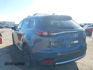 2022 Mazda CX-9 Grand Touring with VIN JM3TCBDYXN0625567, listed as a IAAI auction lot 41327380 with 50,672 mi miles and . Bid and sale history available at DreamBid. Image 3.