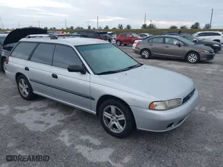 1997 Subaru Legacy Wagon L with VIN 4S3BK4350V7309435, listed as a IAAI auction lot 40521784 with 200,182 mi miles. Bid and sale history available at carsss.com. Image 1.