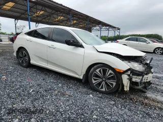 2016 Honda Civic EX-T с VIN 2HGFC1F35GH641158, выставлен на аукционе Copart как лот 59027175 с пробегом Не указан миль и Списание • Salvage title. История ставок и продаж доступна на DreamBid. Изображение 4.