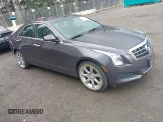 2014 Cadillac ATS Luxury AWD with VIN 1G6AH5SX4E0113500, listed as a IAAI auction lot 41753975 with 69,210 mi miles and . Bid and sale history available at carsss.com. Image 1.