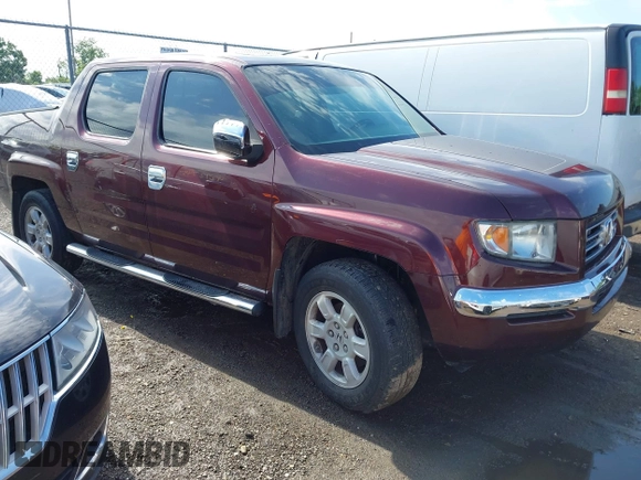 2007 Honda Ridgeline RTL with VIN 2HJYK16587H518901, listed as a IAAI auction lot 42762425 with 206,243 mi miles and . Bid and sale history available at DreamBid. Image 1.
