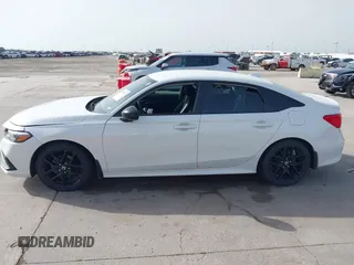 2023 Honda Civic Sport with VIN 2HGFE2F54PH521840, listed as a IAAI auction lot 42258323 with Not provided miles and . Bid and sale history available at DreamBid. Image 13.