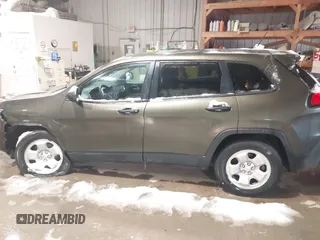2015 Jeep Cherokee Sport with VIN 1C4PJMAB8FW738718, listed as a IAAI auction lot 41575745 with 113,227 mi miles. Bid and sale history available at carsss.com. Image 14.