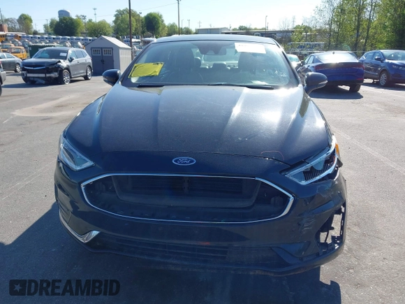 2019 Ford Fusion SEL with VIN 3FA6P0MU6KR252797, listed as a IAAI auction lot 41994504 with 106,029 mi miles and . Bid and sale history available at DreamBid. Image 12.