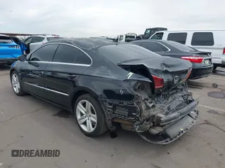 2013 Volkswagen CC Sport with VIN WVWBP7AN6DE504679, listed as a IAAI auction lot 42034362 with 148,527 mi miles. Bid and sale history available at carsss.com. Image 3.