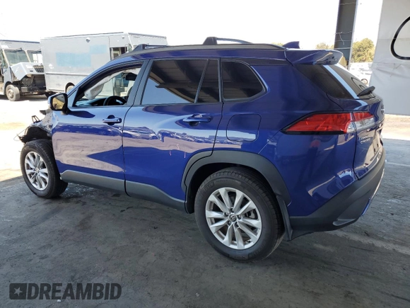 2022 Toyota Corolla Cross LE with VIN 7MUCAAAG6NV021103, listed as a Copart auction lot 56882015 with 21,769 mi miles and Salvage title. Bid and sale history available at DreamBid. Image 2.