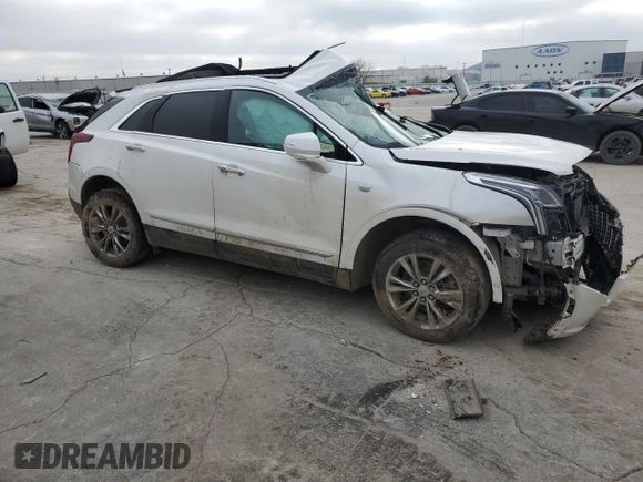 2021 Cadillac XT5 FWD Premium Luxury z VIN 1GYKNCR41MZ154357, wystawiony jako Copart lot #86819564 z przebiegiem Nie podano mil oraz Nie do naprawy • Non repairable. Historia ofert i sprzedaży dostępna na DreamBid. Obrazek 4.