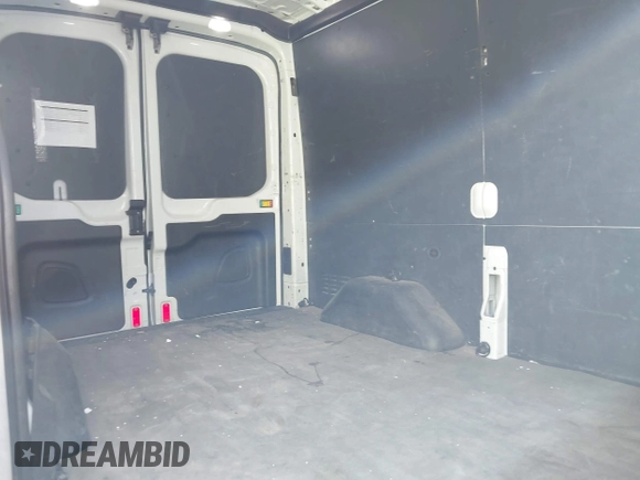 2018 Ford Transit with VIN 1FTYE1CMXJKA35806, listed as a IAAI auction lot 41652642 with 200,828 mi miles and . Bid and sale history available at DreamBid. Image 8.