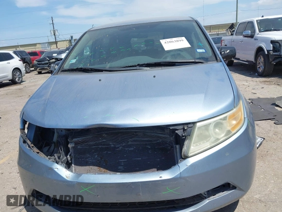 2013 Honda Odyssey EX z VIN 5FNRL5H4XDB062760, wystawiony jako IAAI lot #42063899 z przebiegiem 181 658 mil mil oraz . Historia ofert i sprzedaży dostępna na DreamBid. Obrazek 13.