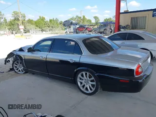 2008 Jaguar XJ with VIN SAJWA79B48SH22788, listed as a IAAI auction lot 41530902 with 124,334 mi miles. Bid and sale history available at carsss.com. Image 14.