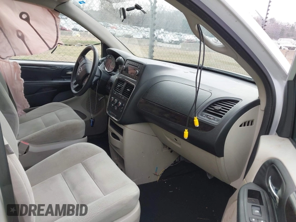 2014 Dodge Grand Caravan American Value with VIN 2C4RDGBG6ER380568, listed as a IAAI auction lot 41683180 with 303,612 mi miles and . Bid and sale history available at DreamBid. Image 5.