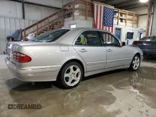 2002 Mercedes-Benz E-Class with VIN WDBJF65J52B497463, listed as a Copart auction lot 82372014 with 201,131 mi miles and Salvage Title. Bid and sale history available at carsss.com. Image 3.