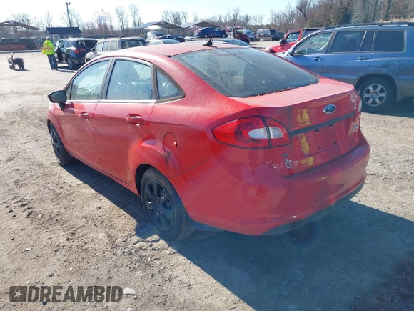 2012 Ford Fiesta SE with VIN 3FADP4BJ3CM155725, listed as a IAAI auction lot 41795297 with 128,517 mi miles. Bid and sale history available at carsss.com. Image 3.