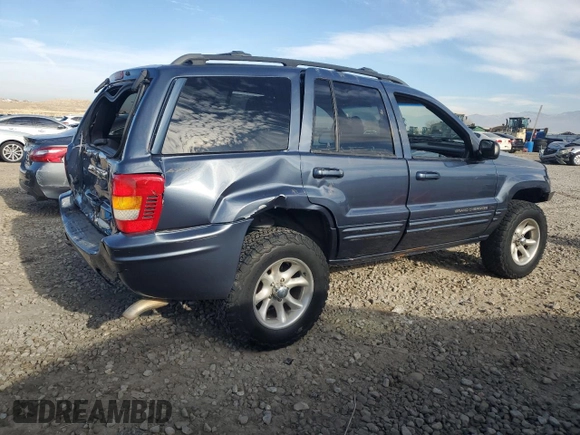 2001 Jeep Grand Cherokee Limited with VIN 1J4GW58N21C591520, listed as a Copart auction lot 42445475 with 247,858 mi miles and Salvage Title. Bid and sale history available at DreamBid. Image 3.