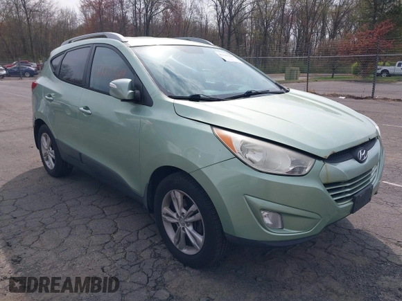 2013 Hyundai Tucson GLS with VIN KM8JU3AC7DU580229, listed as a IAAI auction lot 42127349 with 204,975 mi miles. Bid and sale history available at carsss.com. Image 1.