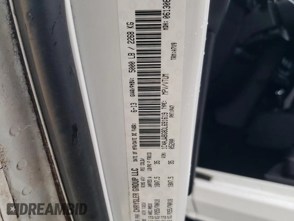 2013 Jeep Wrangler Sahara with VIN 1C4AJWBG8DL691619, listed as a Copart auction lot 56194275 with 103,299 mi miles and Salvage title. Bid and sale history available at DreamBid. Image 13.