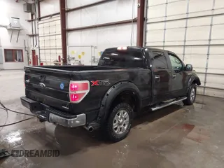 2011 Ford F-150 XL with VIN 1FTFW1EFXBKD42235, listed as a IAAI auction lot 41812147 with 220,144 mi miles. Bid and sale history available at carsss.com. Image 4.
