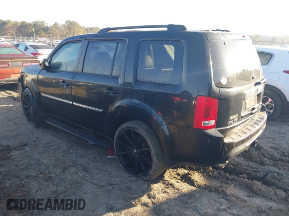2015 Honda Pilot Touring with VIN 5FNYF3H94FB014659, listed as a IAAI auction lot 41474827 with 109,531 mi miles. Bid and sale history available at carsss.com. Image 3.