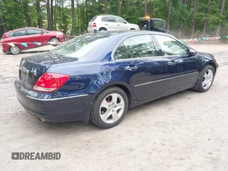 2006 Acura RL z VIN JH4KB16566C007214, wystawiony jako IAAI lot #42510457 z przebiegiem 160 005 mil mil oraz . Historia ofert i sprzedaży dostępna na DreamBid. Obrazek 4.
