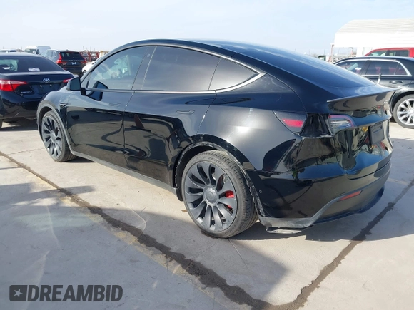 2022 Tesla Model Y Performance with VIN 7SAYGDEF6NF532027, listed as a IAAI auction lot 41717662 with 36,537 mi miles and . Bid and sale history available at DreamBid. Image 3.