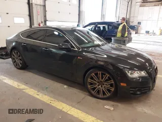 2015 Audi A7 3.0 Premium Plus with VIN WAUWGAFC2FN011927, listed as a IAAI auction lot 41846990 with 98,051 mi miles. Bid and sale history available at carsss.com. Image 1.